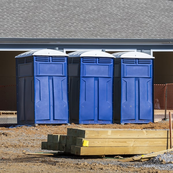 how often are the portable restrooms cleaned and serviced during a rental period in North Grafton